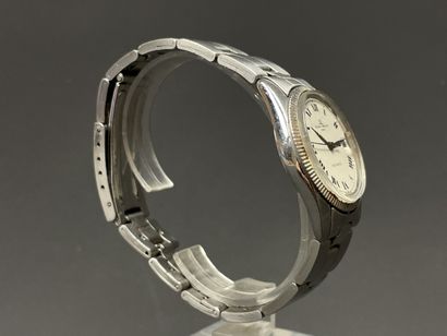 Baume & Mercier. Baumatic
Steel watch, round...