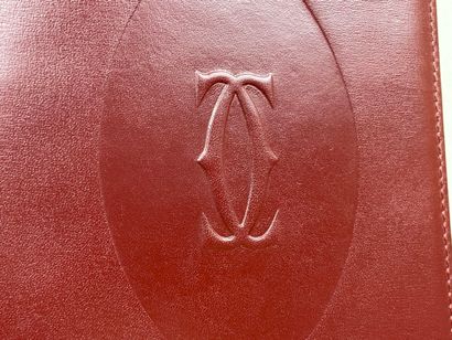 CARTIER: Bordeaux leather organizer.
Warranty...