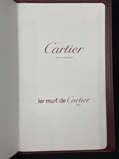 CARTIER: Bordeaux leather organizer.
Warranty...