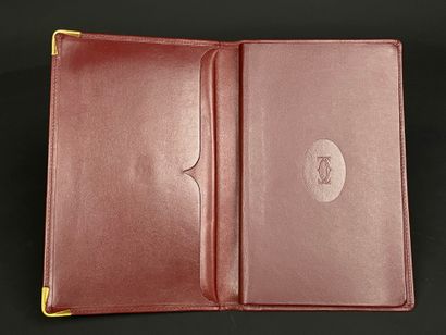 CARTIER: Bordeaux leather organizer.
Warranty...