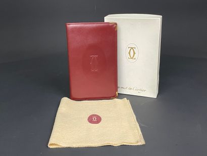 CARTIER: Bordeaux leather organizer.
Warranty...
