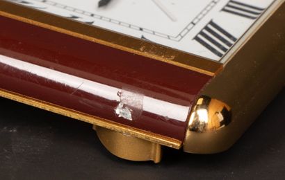 CARTIER Desk clock, gilt metal and burgundy...