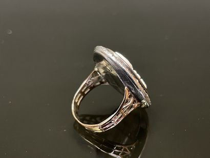 Gold and silver ring, cameo, surrounded by...