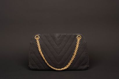 CHANEL. Evening bag in black jersey with...