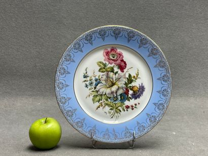 Assiette en porcelaine de Limoges à décor...