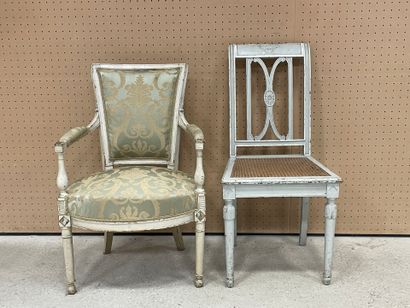 Fauteuil en bois sculpté et patiné.
Styl...