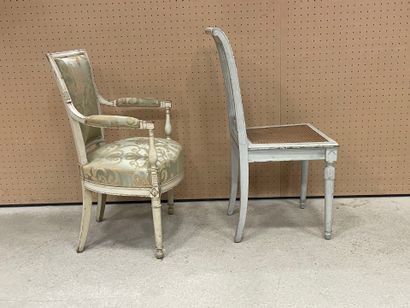 Fauteuil en bois sculpté et patiné.
Styl...