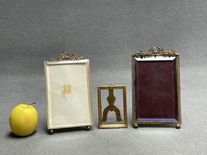 Trois cadres photo en bronze et verre.
20...