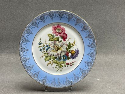 Assiette en porcelaine de Limoges à décor...