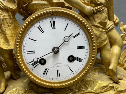 Pendule en régule doré fin XIX°
socle doré,...