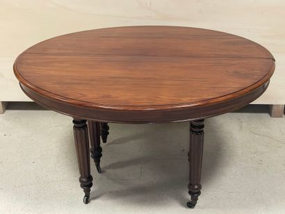 Table à six pieds en acajou et placage d'acajou.
Epoque...
