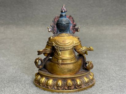Bouddha en bronze patiné et doré.
XX°
H:...