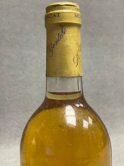 2 bouteilles: 
-Chateau Carbonnieux, 1993....