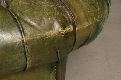 Green leather upholstered Chesterfield sofa.
Early...