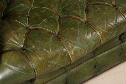 Green leather upholstered Chesterfield sofa.
Early...