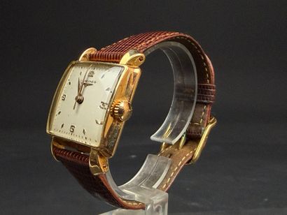 LONGINES . 
Montre d'homme en or, cadran...