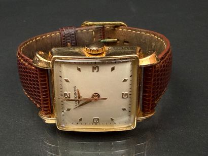 LONGINES . 
Montre d'homme en or, cadran...