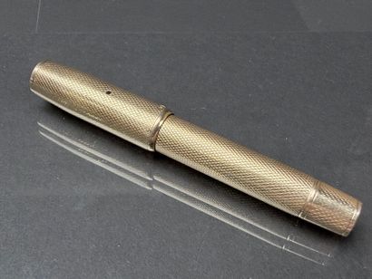 Stylo plume en or guilloché.
Or 750°/00
Poids...