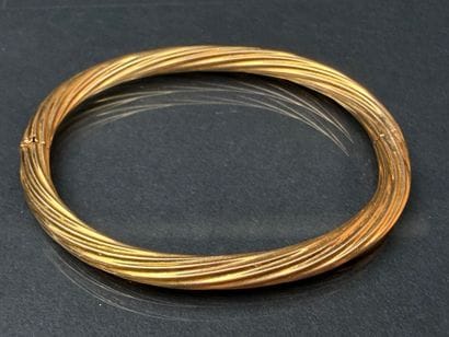 Bracelet jonc en or torsadé.
Or 750°/00,...
