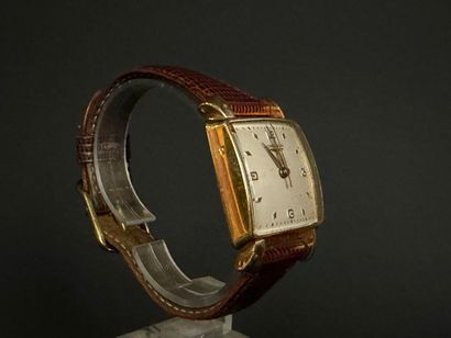 LONGINES . 
Montre d'homme en or, cadran...