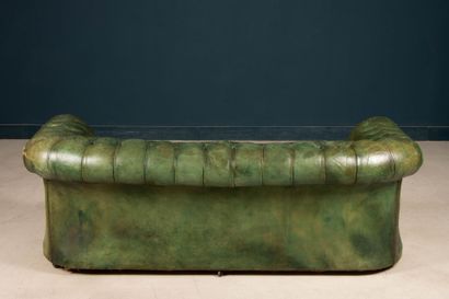 Green leather upholstered Chesterfield sofa.
Early...