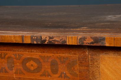 Inlaid flat desk opening to three drawers.
Transitional...