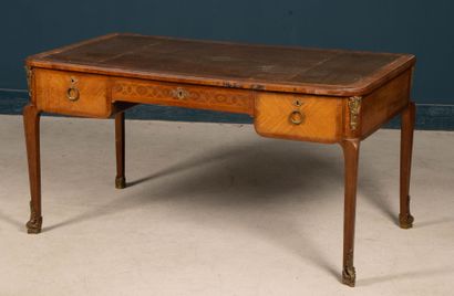 Inlaid flat desk opening to three drawers.
Transitional...