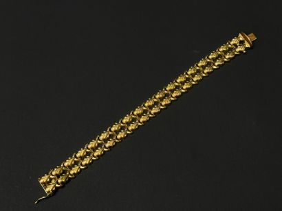 Bracelet articulé, mailles feuillagées sur...