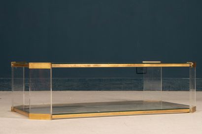 Brass coffee table with glass tops. 
Circa...