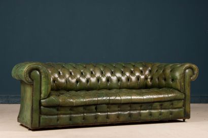 Green leather upholstered Chesterfield sofa.
Early...