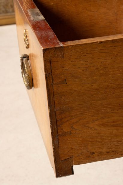 Inlaid flat desk opening to three drawers.
Transitional...
