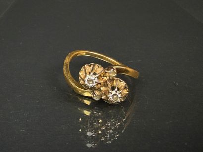Bague toi et moi en or sertie de deux petits...