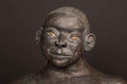 Large bust of an African man in patinated...