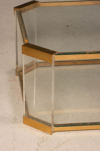 Brass coffee table with glass tops. 
Circa...