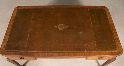 Inlaid flat desk opening to three drawers.
Transitional...