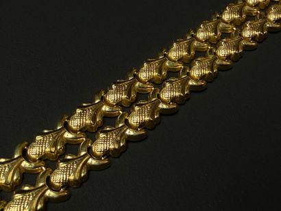 Bracelet articulé, mailles feuillagées sur...