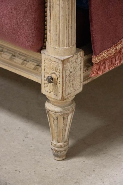 Carved lacquered wood bed with crushed raspberry...