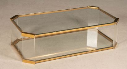 Brass coffee table with glass tops. 
Circa...