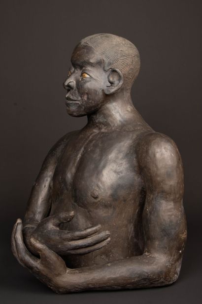 Large bust of an African man in patinated...