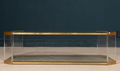 Brass coffee table with glass tops. 
Circa...