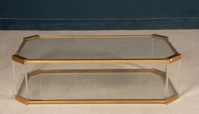 Brass coffee table with glass tops. 
Circa...
