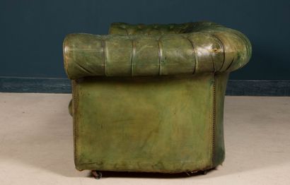 Green leather upholstered Chesterfield sofa.
Early...