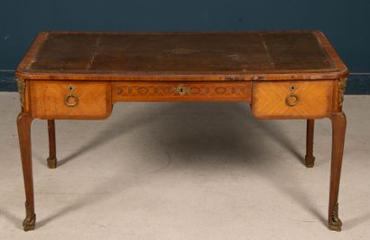 Inlaid flat desk opening to three drawers.
Transitional...