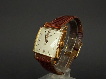 LONGINES . 
Montre d'homme en or, cadran...