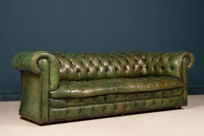 Green leather upholstered Chesterfield sofa.
Early...