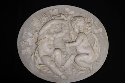 Suite of four bas-relief medallions, in patinated...