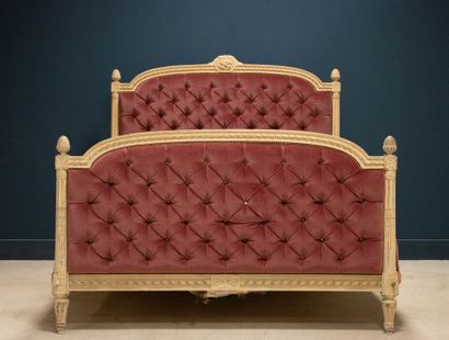 Carved lacquered wood bed with crushed raspberry...
