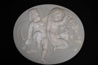 Suite of four bas-relief medallions, in patinated...