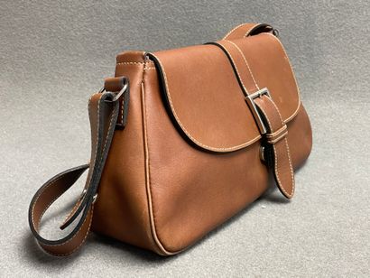 Deux sacs à main en cuir . 
Pourchet, 20...