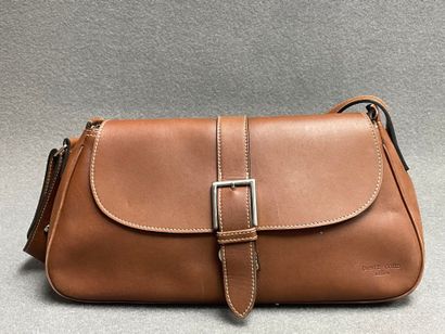 Deux sacs à main en cuir . 
Pourchet, 20...